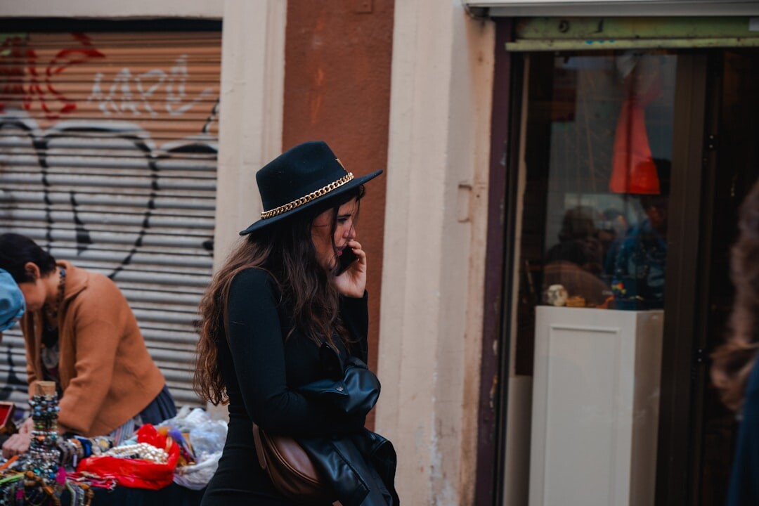 Latina woman laughing candidly on the street