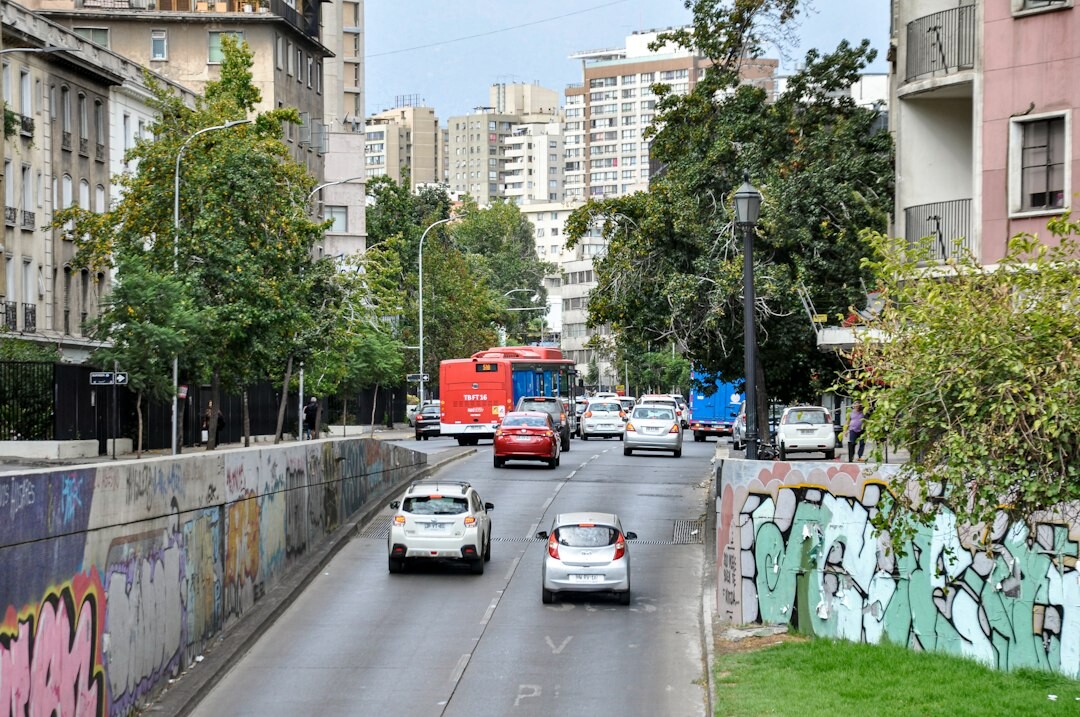 Documentary street scene in Santiago, Chile with pedestrians and city buildings